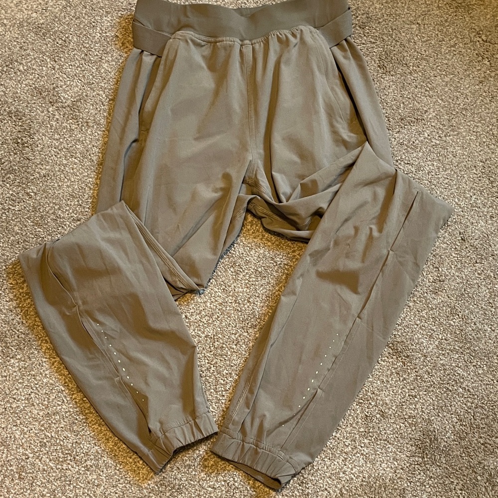 Lululemon khaki colored running jogger pants with airflow
